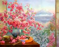 Ваза с цветами сакуры на фоне горы Фуджи