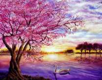 Лебедь на озере под цветущей сакурой