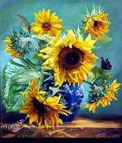 Букет желтых подсолнухов в синей вазе